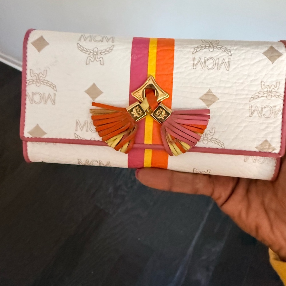 MCM White Visetos Leather Tassel Wallet.